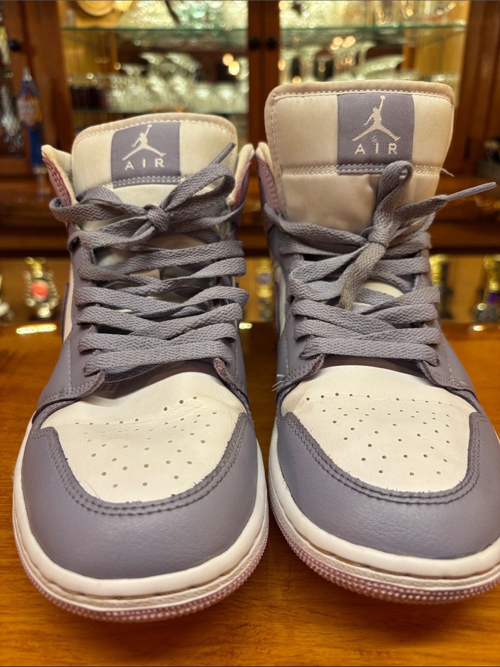 Woman’s Jordan Air 1 Mid Sneakers in Lavender and White